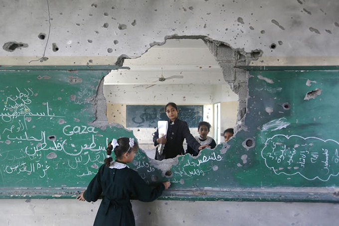 Manar, 11, and her friends at their school damaged by Israeli bombing in Gaza.