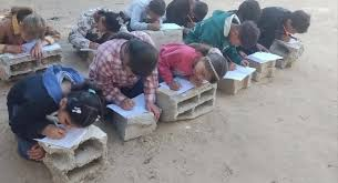 Students in Gaza turn rubble into desks.